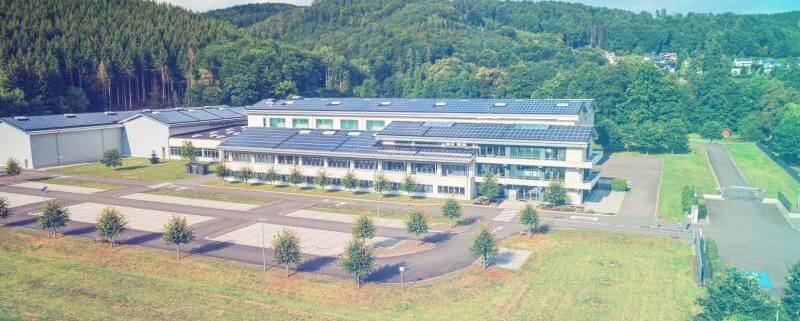 H&K Müller- Außenansicht des Unternehmensgebäudes im Luftbild